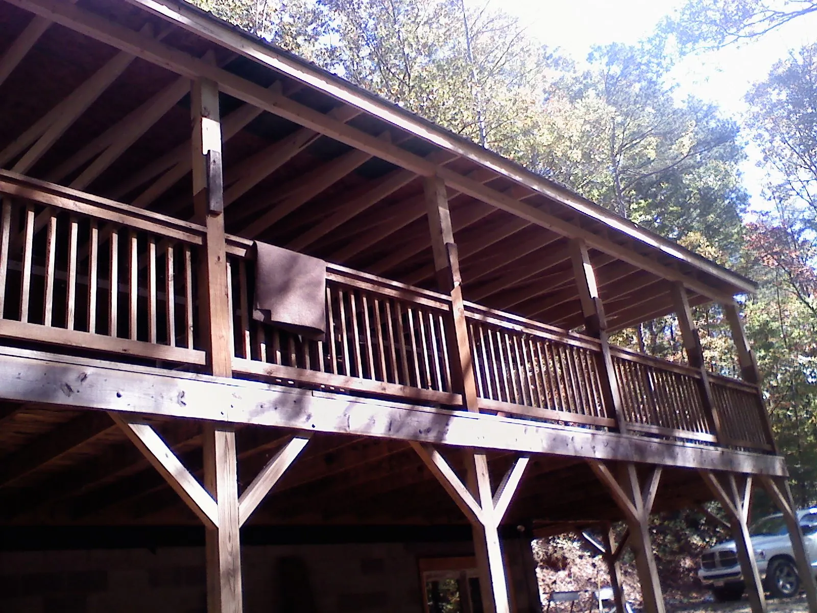 Timber framing under a new elevated porch and deck — Roof Leak Repair in Hankins by Roofing Brothers